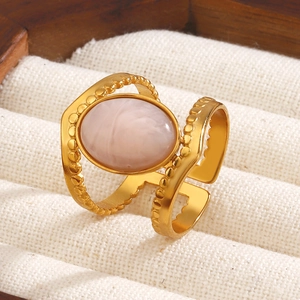 18K gold plated stainless steel ring with pink oval marble stone on beige jewelry box