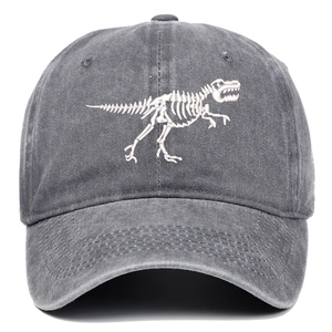 Close-up of dinosaur skeleton embroidery on washed dark gray cotton baseball cap