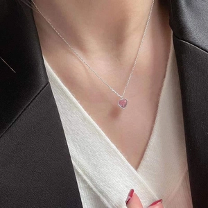 Elegant S925 sterling silver necklace with pink heart zircon pendant on a model