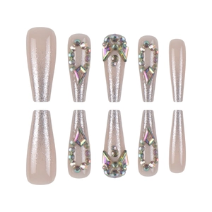 Luxe 3D press-on nails with aurora crystals and sea salt glitter on coffin shape