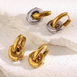 Modern two-tone 18K gold plated hoop earrings with oval zircon charms on stone