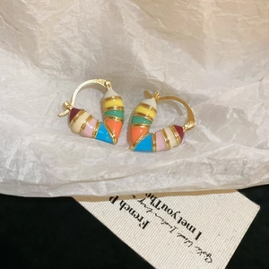 Colorful rainbow enamel heart-shaped huggie earrings in gold finish for women