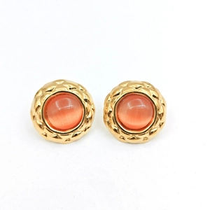 Vintage gold-plated button studs with quilted pattern and peach cat-eye stone inlay