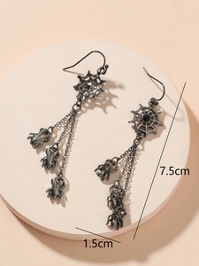 Detail of spider web tassel earrings in gunmetal finish measuring 7.5cm in length