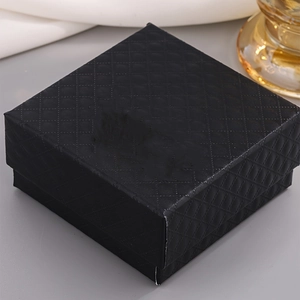 Classic black square jewelry box with elegant diamond texture and 18K gold accents