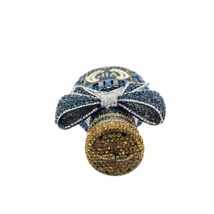 Detailed close-up of a luxury crystal wine bottle clutch with VIP rhinestone pattern