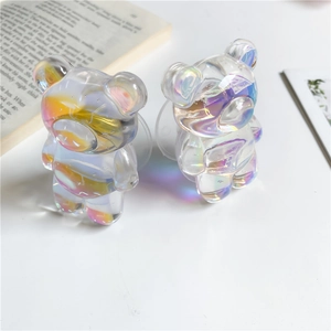 Detailed view of dual transparent laser bear phone grips with aurora gradient effect