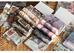 Detail of vintage scrapbooking paper set with classic art motifs and floral prints