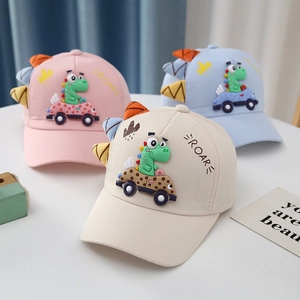 Kids dinosaur baseball caps in pink, blue, and beige with cartoon car embroidery