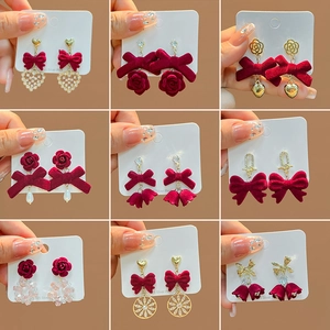Red velvet bow earrings with S925 silver pins and pearls shown in a grid layout