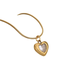 Minimalist gold stainless steel snake chain necklace featuring a crystal heart pendant