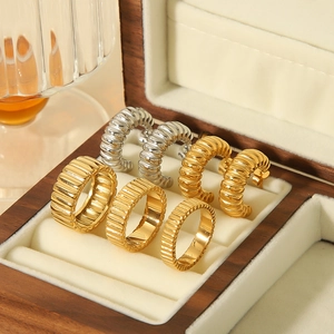 Vintage 18K gold and silver gear rings and hoop earrings jewelry set in wooden box