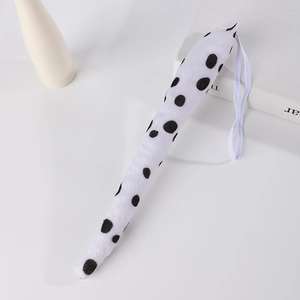 Detail of plush Dalmatian spotted tail accessory with elastic loop for kids costume