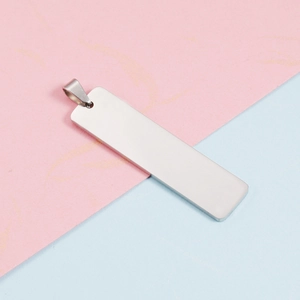 Polished silver rectangular stainless steel pendant for custom engraving on split background