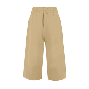 Close-up of khaki linen wide-leg trousers featuring elastic high waist and drawstring detail