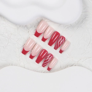 Handmade long coffin press-on nails with Christmas snowflake and French red tips