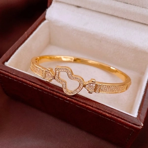 18K gold plated hollow gourd bangle with diamonds in a luxury jewelry box