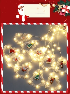 Detail view of transparent Christmas tree bulbs with festive Santa and snowman figurines