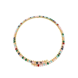 Detailed macro view of gold-tone choker featuring colorful oval-cut gemstones