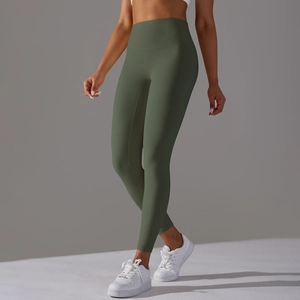 Close-up of olive green high-waisted yoga leggings with seamless fit and smooth texture