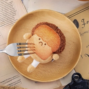 Plüsch-Toast-Schlüsselanhänger mit traurigem Gesicht und kleinen weißen Beinen