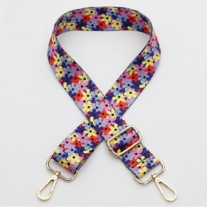 Detail of adjustable floral woven bag strap No. 358 with premium gold metal hardware