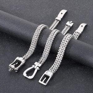 Three men's stainless steel woven chain bracelets with skull, U-shape and belt buckle magnetic clasps