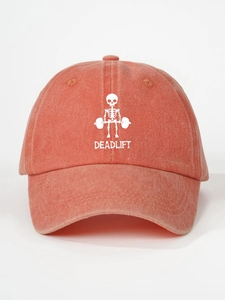 Detail of the vintage washed cotton texture and deadlift skull print on the red baseball cap
