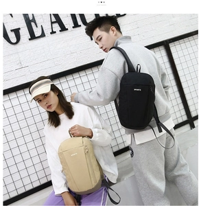 Compact black and khaki sports backpacks with vertical zipper pocket and SPORTS logo