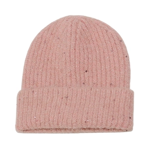 Detail of pink knit beanie featuring shimmering sequins and thick ribbed wool texture
