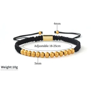 Detail of adjustable black woven bracelet with 5mm gold copper beads and 10g weight