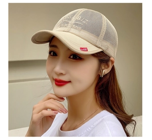 Detail of breathable mesh baseball cap with side red logo and front embroidery