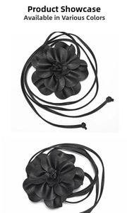 Detail of a black PU leather flower waist rope with long tie-up straps in bohemian style