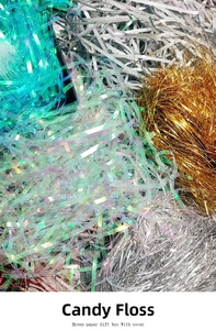 Macro view of colorful iridescent shredded paper for gift box packing and DIY crafts
