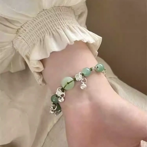 Elegant Chinese style butterfly bamboo bracelet with light green beads and silver charms