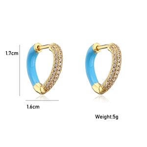 Detail view of gold heart hoop earrings with dimensions 1.7cm by 1.6cm and 5g weight