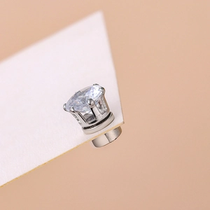 Silver magnetic stud earring with a round clear zircon in a crown-style claw setting