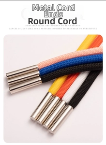 Close-up of colorful round drawstring cords with polished metal aglets for hoodies