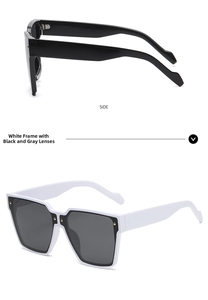 Side view detail of square sunglasses with thick frames and gold rivet decorations