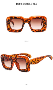 Close-up of kids square bubble sunglasses in demi-double tea leopard pattern