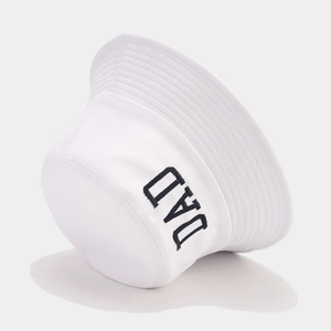 Detail of the high-quality black DAD embroidery on a white cotton canvas bucket hat