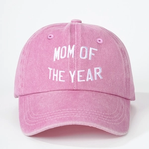 Pink washed cotton baseball cap with white MOM OF THE YEAR embroidery on front