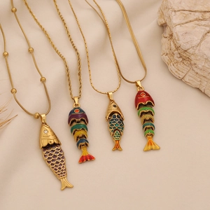 Four colorful fish pendant necklaces in gold stainless steel with enamel details