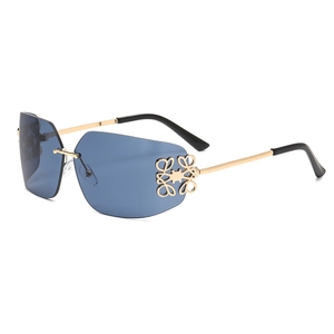 Chic rimless square sunglasses with light blue lenses and gold metal Anagram logo detail
