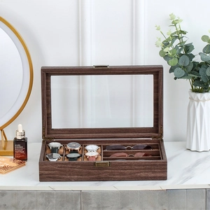 Walnut wood watch and glass display box with clear glass lid and vintage metal clasp