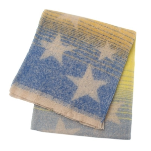 Detailed texture of blue and yellow gradient scarf with soft star pattern jacquard