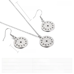 Detail view of stainless steel zodiac compass pendant necklace and earrings jewelry set