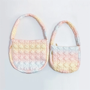 Quilted gradient cloud bag showing two sizes with pink yellow and blue rhombic patterns