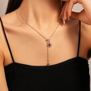 Vintage silver sun flower necklace with faux tiger eye stone on female model