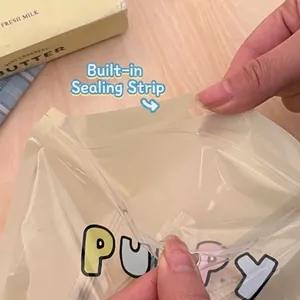 Cute transparent puppy snack storage bag with colorful print and ziplock seal